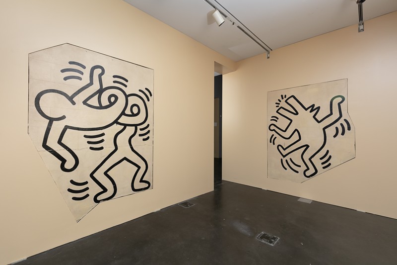 Morphing figure and wolfman, from the Grace House mural by Keith Haring, at MCA Denver. Paint on painted concrete block.
