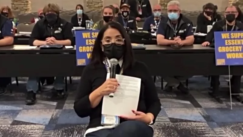 Image: Local 7 president Kim Cordova, foreground, as seen during a video offering an update on negotiations with King Soopers on January 14.