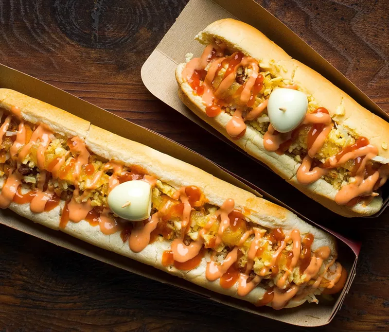 Image: Colombian hot dogs are a staple at La Rola.