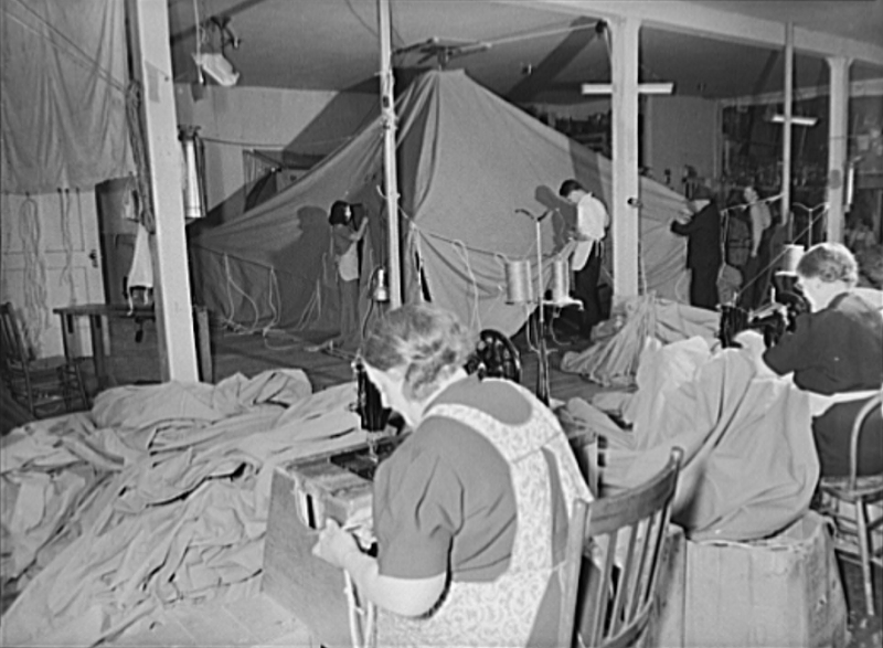 Workers for Schaeffer Tent and Awning Company in Denver create pyramidal tents for the soldiers in the field during World War II
