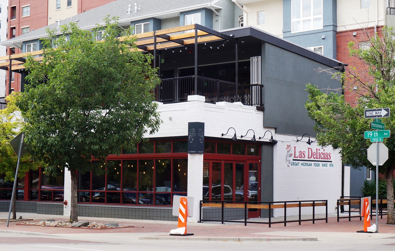 The new Las Delicias sports a rooftop bar and patio that matches the original building to the neighborhood's modern vibe.