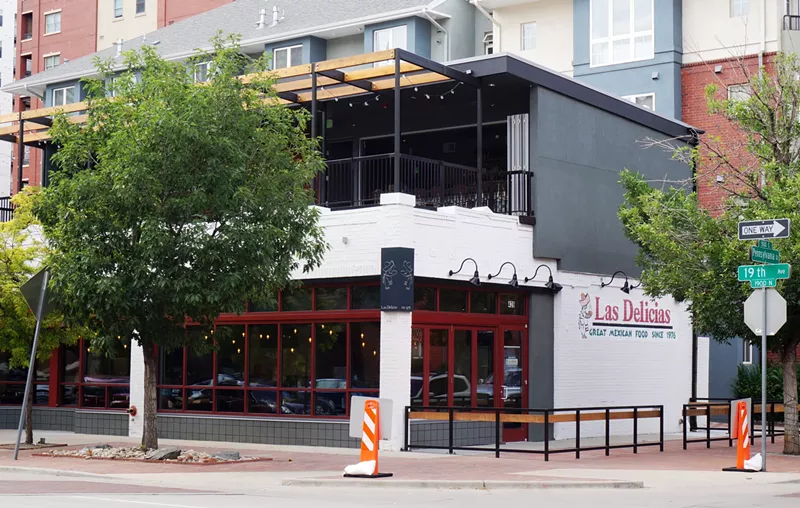 Image: The new Las Delicias sports a rooftop bar and patio that matches the original building to the neighborhood's modern vibe.