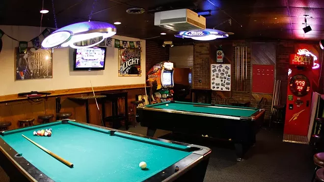 inside dive bar with pool tables