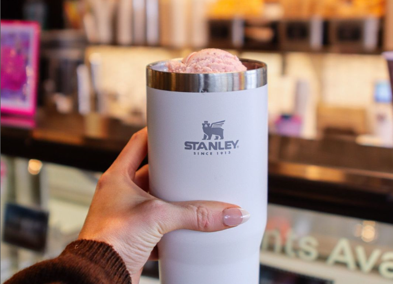 Image: hand holding a stanley cup filled with ice cream