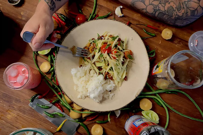 Image: Som tum (green papaya salad) is one of the meals offered by Saranya Cooks Thai.
