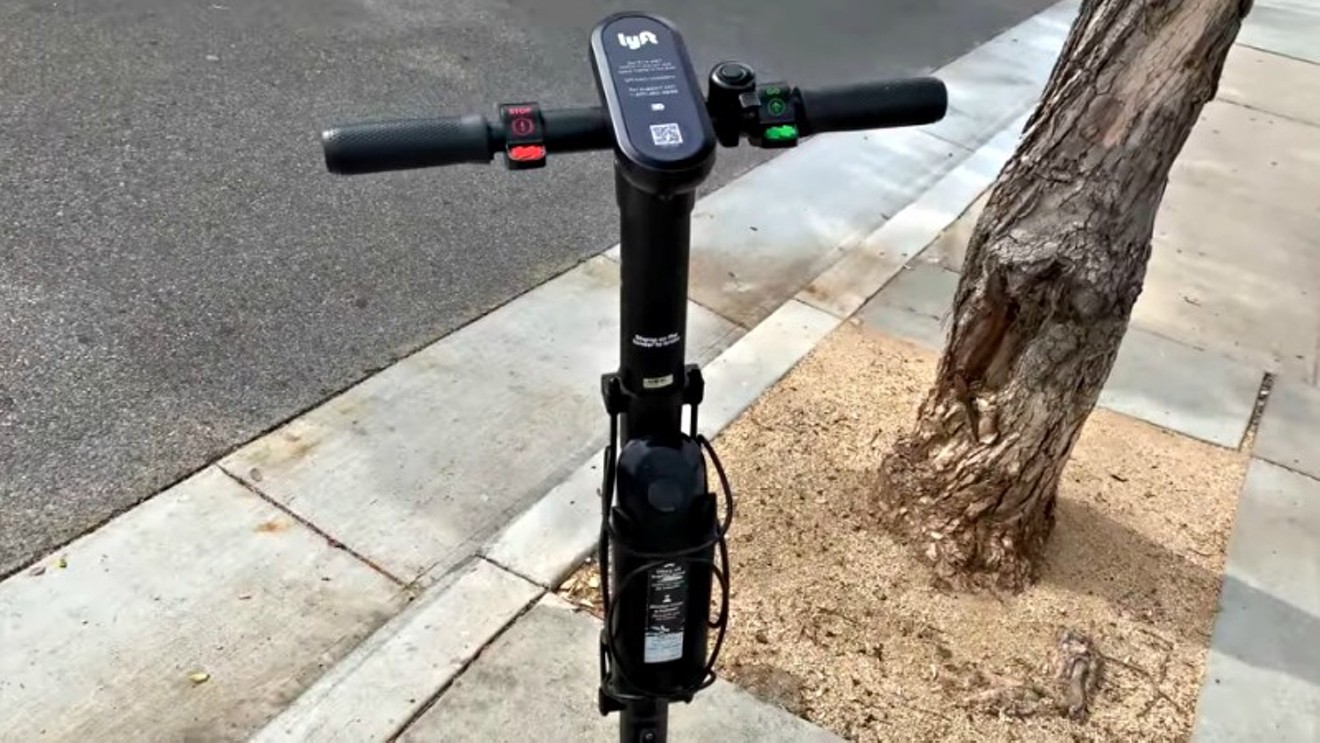 A Lyft electric scooter just waiting for a rider.