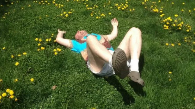 Image: Yes, this is the next governor of Colorado, imitating the way his dog rolled on the lawn.