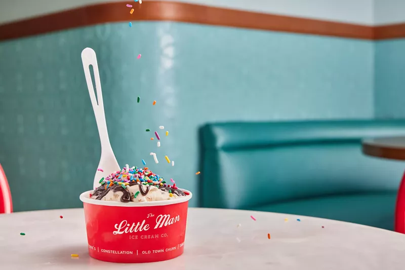 Image: sprinkles falling on a cup of ice cream
