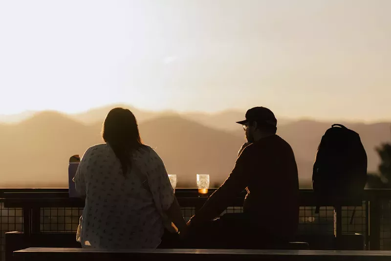 Image: Rooftop patio with mountain views.