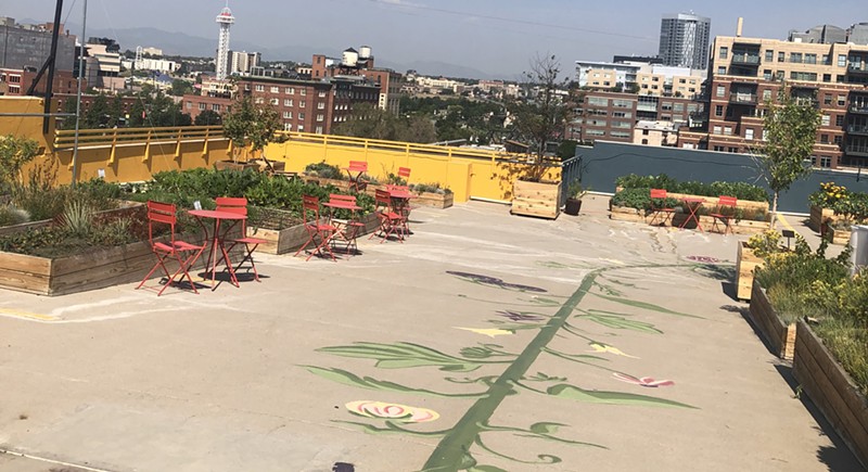 The stage for the rooftop concerts will be near the yellow walls.