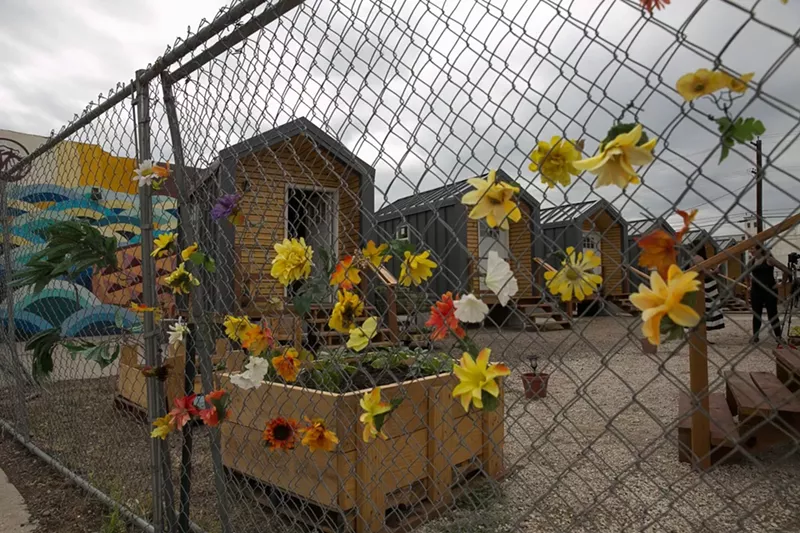 Image: The Beloved Community Village houses fifteen people at the intersection of Walnut and 38th streets.