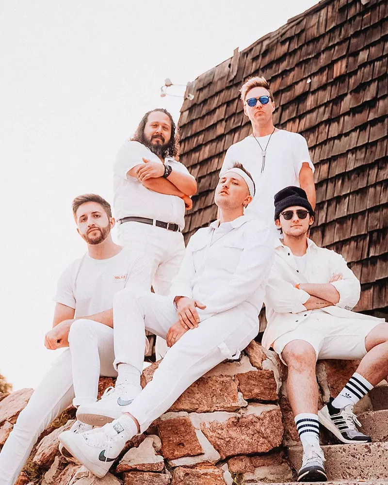 Image: Lead singer and keyboardist of indie-rock/electronica band Neon the Bishop, Kendall James (pictured in center), rounded up local musicians and sponsors for "Local Loving Local - Wild Fire Fundraiser," a benefit concert on Friday, February 4. Proceeds raised will go to the victims of the Marshall Fire.