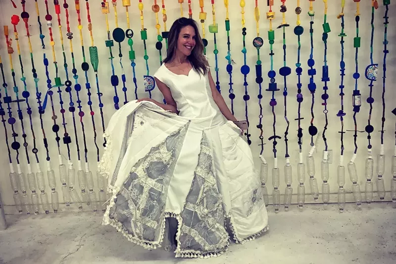 Image: A Trash Fashion Show model strikes a preview pose.