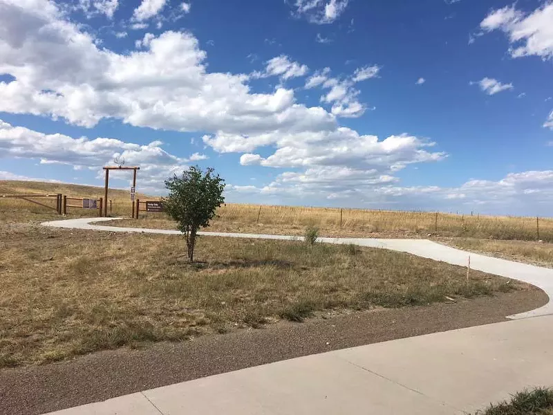 Image: The entrance to the Woman Creek Loop trail at the Rocky Flats National Wildlife Refuge.