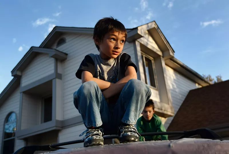 Image: Falcon Heene, the balloon boy, safe at home after the air went out of the hoax.