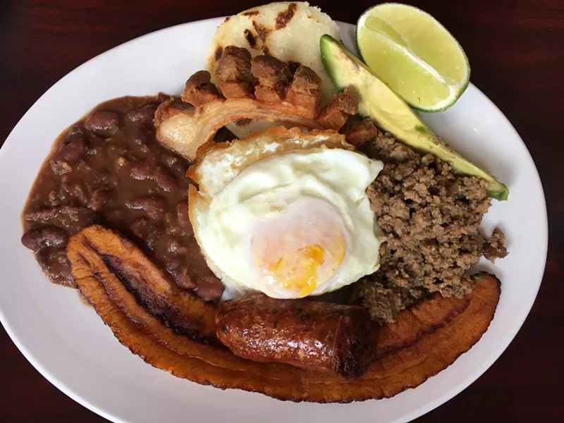 Image: This is just the sampler size of the bandeja paisa at Los Parceros. Be prepared for leftovers.