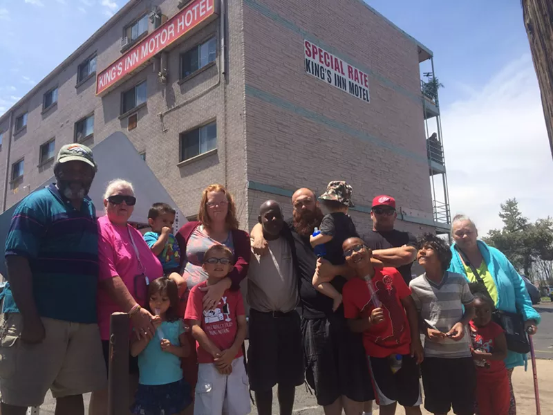 Image: Residents at the King's Inn Motel in Aurora, who face homelessness.