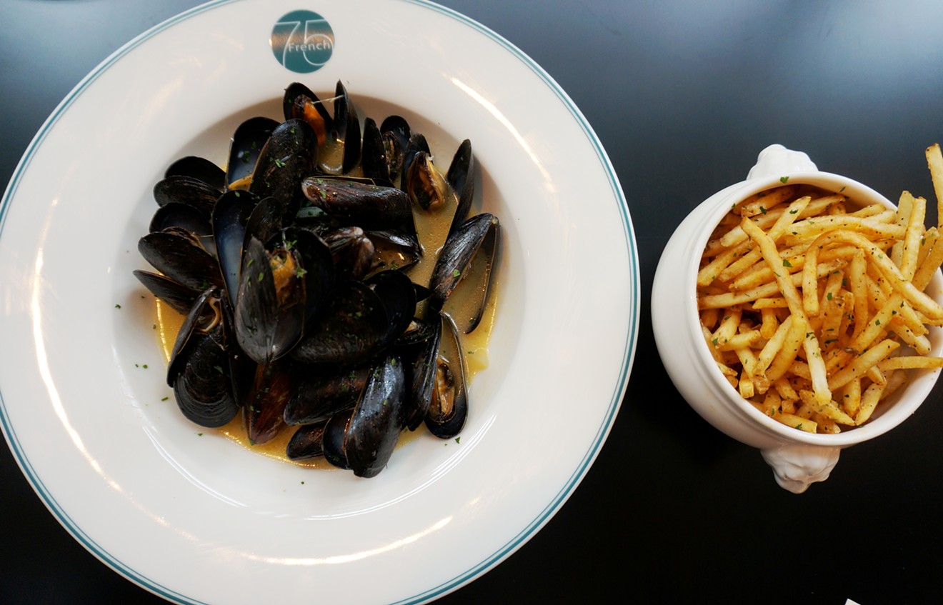 Moules frites — and a serving dish with the French 75 logo.