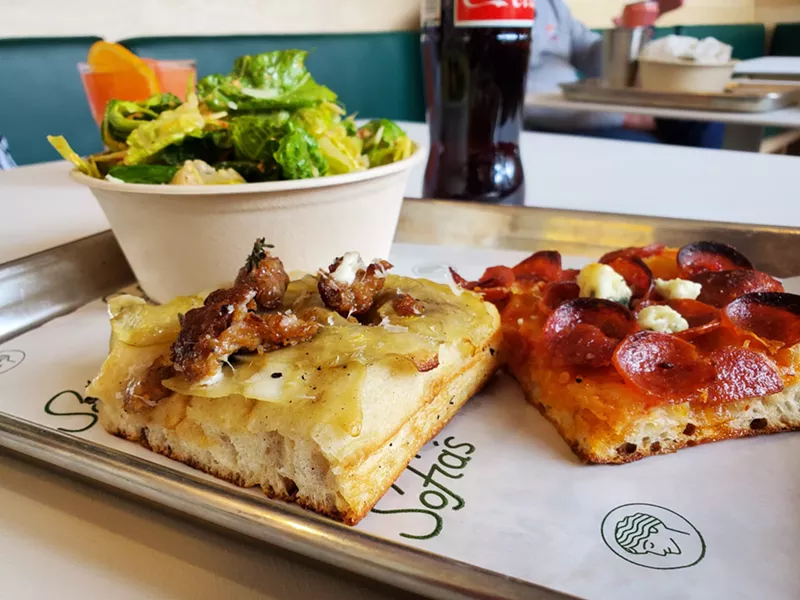 Image: two slices of pizza and a salad