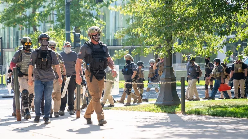 Image: Some of those who took part in the October 10 Patriot Muster were garbed for battle, as seen in our slideshow "Dueling Demonstrations End With a Shooting at Civic Center Park."