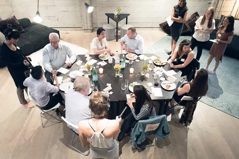 Image: Guests of differing political opinions agree on civil conversation at a MADA dinner in San Francisco.
