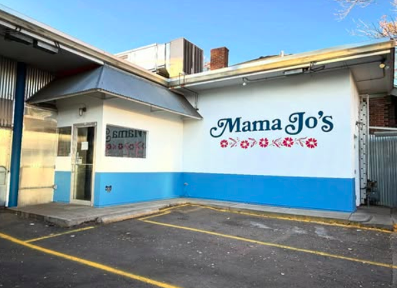 Image: exterior of a white and blue building