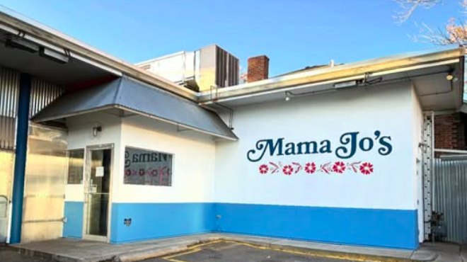 exterior of a white and blue building