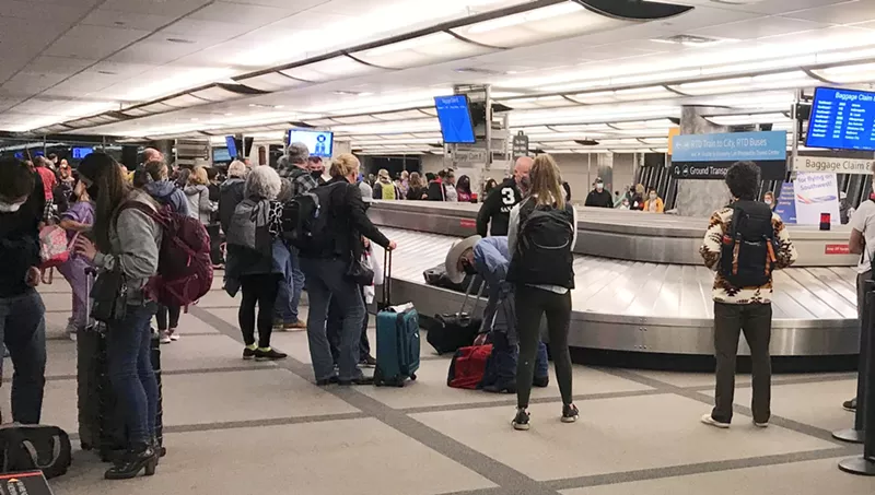 Image: The baggage claim area at Denver International Airport on the evening of October 19.