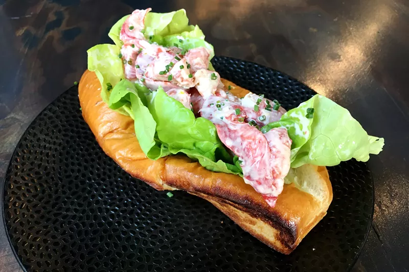 Image: Manzo's Maine-style lobster roll is dressed in lemon aioli.