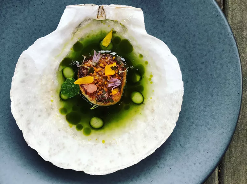 Image: Scallop with asparagus, ramp and bee pollen.