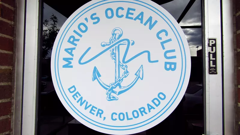 Image: The new Mario's logo on the front door at 560 South Broadway.