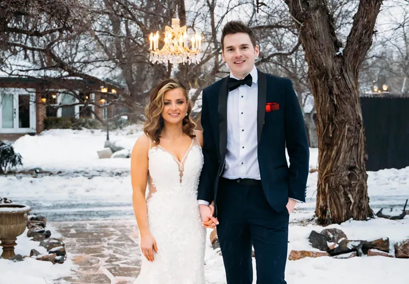 Image: Clare and Cameron pose for a wedding portrait.