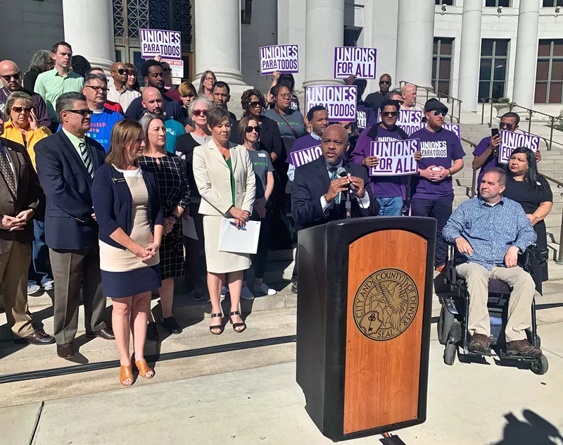 Image: Mayor Michael Hancock unveiled a $15-per-hour minimum-wage proposal in front of the City and County Building on September 19.