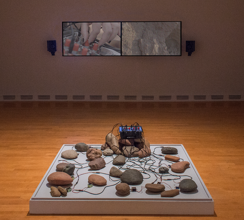 Image: Tania Candiani uses a percutor to create a feedback loop from rocks from Red Rocks Amphitheatre.