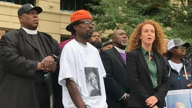 Image: Attorney Mari Newman flanked by the parents of the late Elijah McClain during a 2019 press conference.