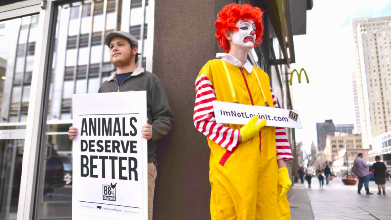 A sad Ronald McDonald was among the protesters at a demonstration outside the 16th Street Mall McDonald's in April.