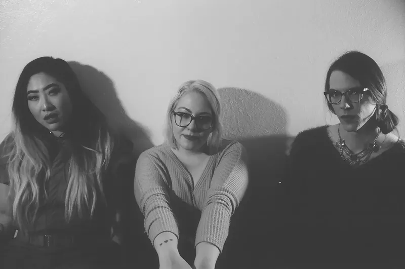Image: The Milk Blossoms are: Michelle Rocqet, Harmony Rose and Blair Larson.
