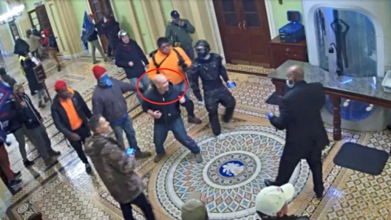Image: Jacob Clark, circled, is seen in a fighting stance in a screen capture from January 6 shared in his FBI affidavit.