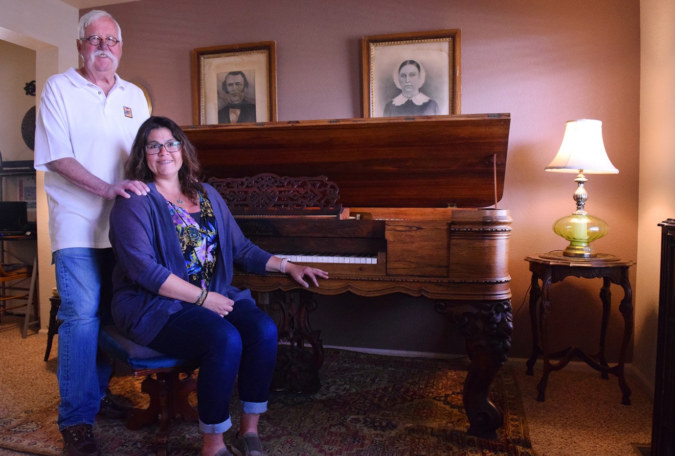 Jeff Ball and Rochelle Ulrich in front of the Baby Doe Tabor piano.