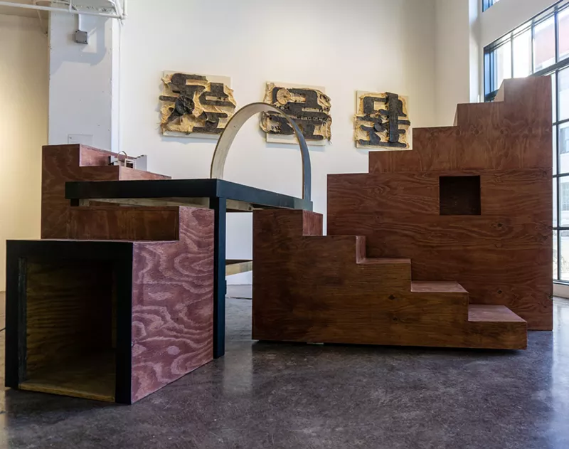 Image: Sammy Lee's "Baoli" (foreground) with "Mop" I II, III on the wall behind.