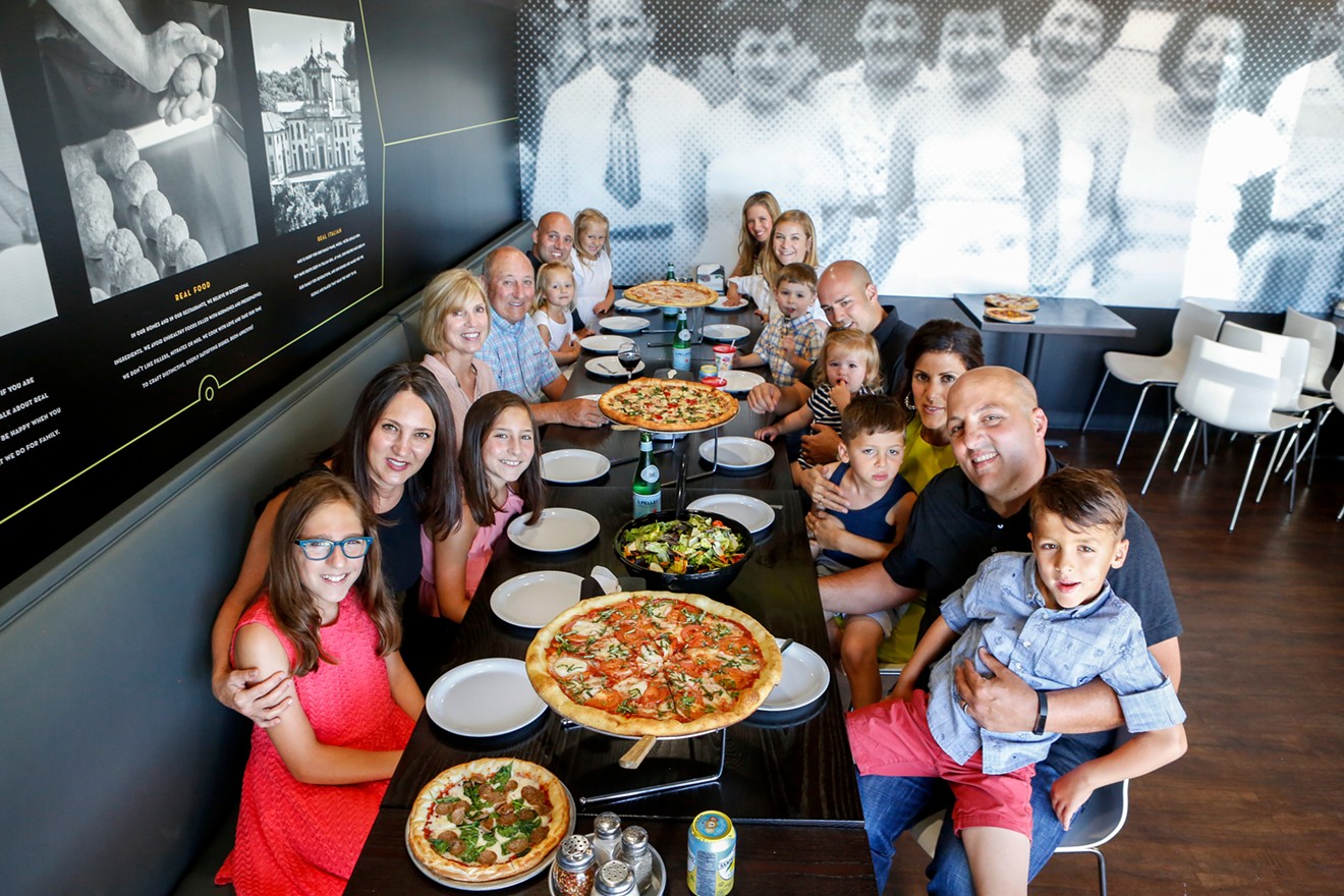 The Miceli and Schiffer families share a meal at Mici.