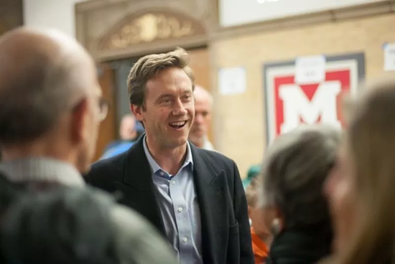 Image: Mike Johnston at Smiley Middle School before the March caucus.