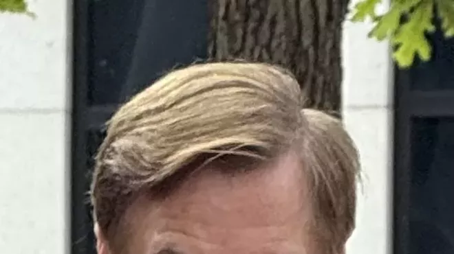 Mike Lindell in prayer before his defamation trial began on Monday in a Denver federal courthouse