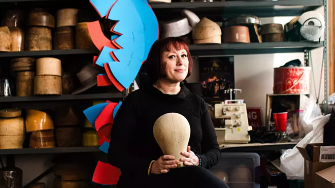 a fashion designer in her studio