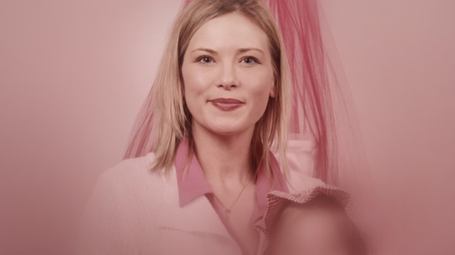 female cult leader pink curtain