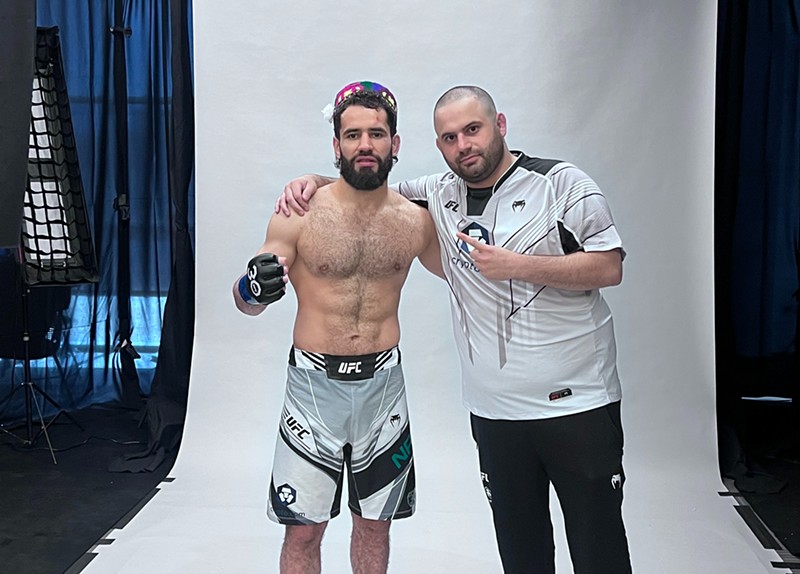 Denver fighter Muhammad Naimov and coach Gokor Ambaryan celebrate a UFC victory on June 3. Naimov was the biggest underdog on the card.