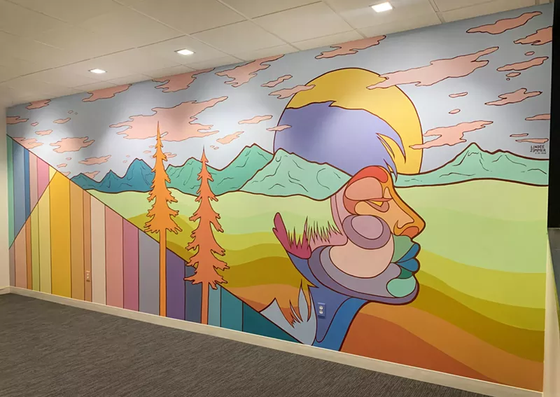 Image: "We Are the Earth," by Lindee Zimmer, at the Westword office.