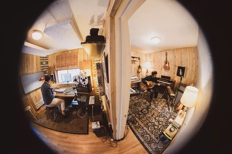 Image: Producer Mark Anderson, left, and musician Miles Eichner in the Cowboy Cowabunga studio.