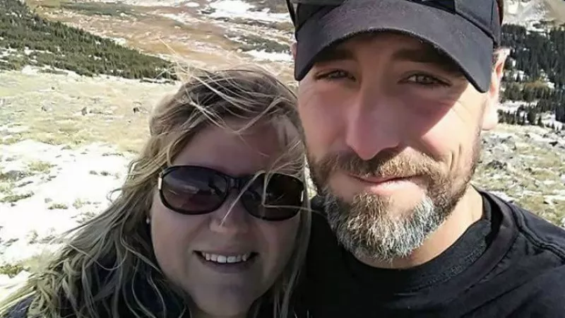 Image: A Facebook photo of the late Adam Lee and his wife, Erika.