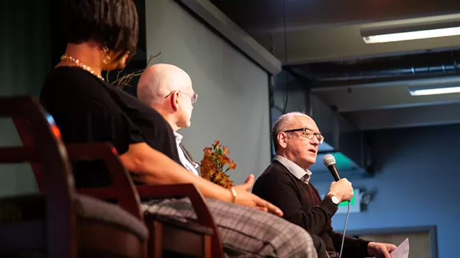 Naropa University president Charles Lief (right) speaks at a Naropa retreat in 2022.